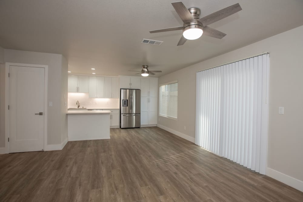 Living room and patio door at Meritage Apartments in Lodi, California