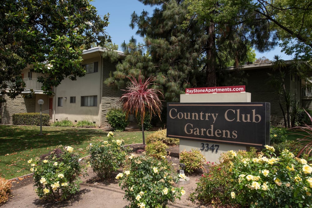 Landscaping and monument sign at Country Club Gardens in Sacramento, California