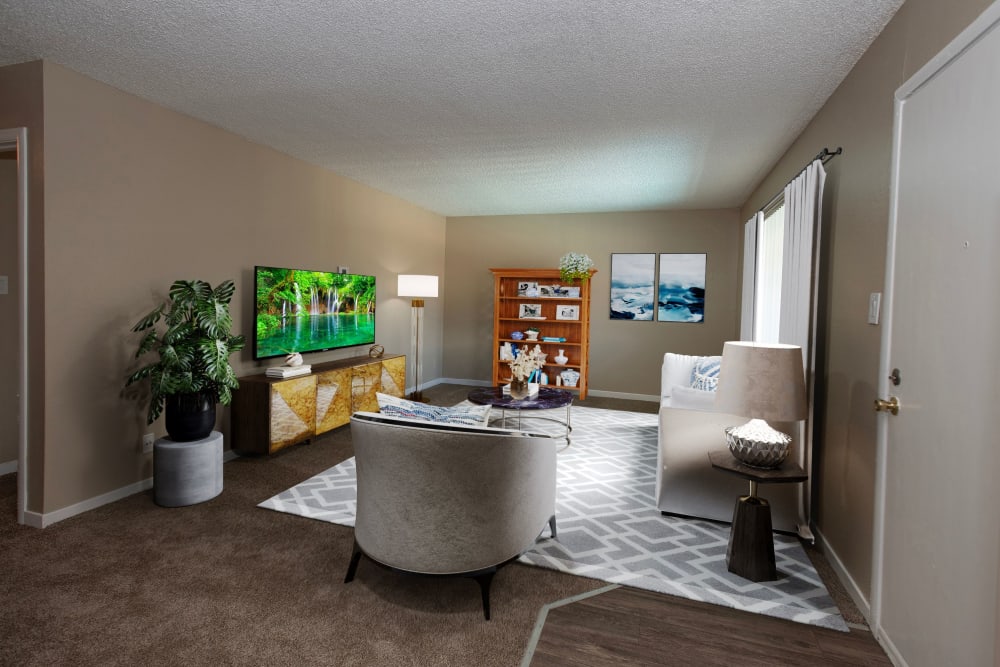 Spacious living room at Corabel Lane Apartments in Sacramento, California
