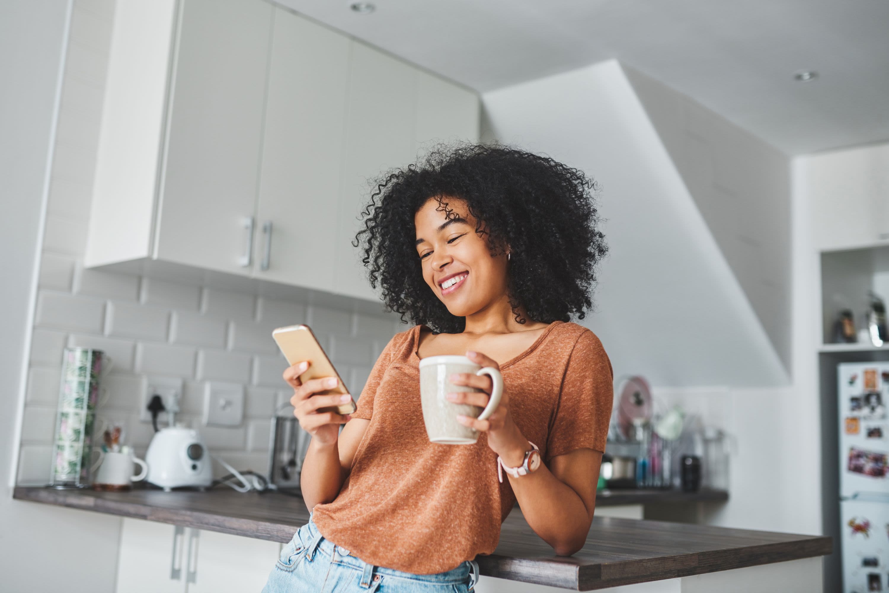 Resident drinking coffee at Arden Palms Apartments in Sacramento, California