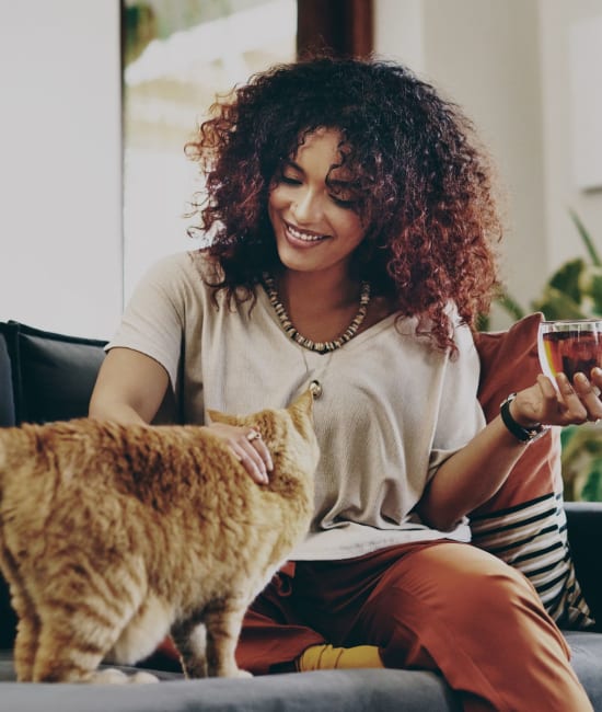 Resident walking pet near Arden Palms Apartments in Sacramento, California