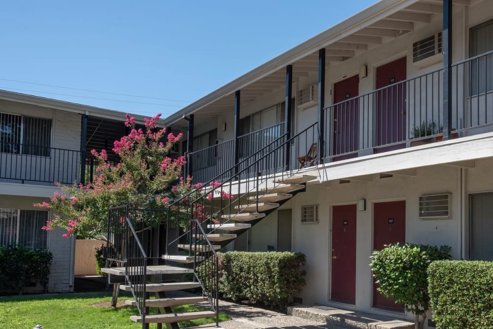 Apartment building with landscaping at Coralaire Apartments in Sacramento, California