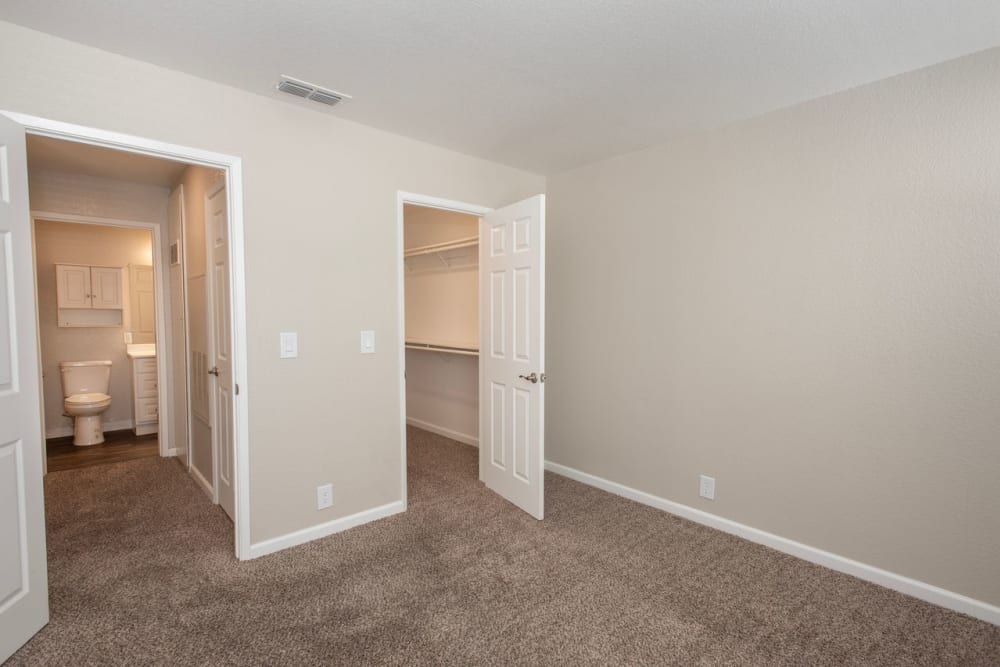 Well-lit bedroom at Zinfandel Ranch Apartments in Rancho Cordova, California