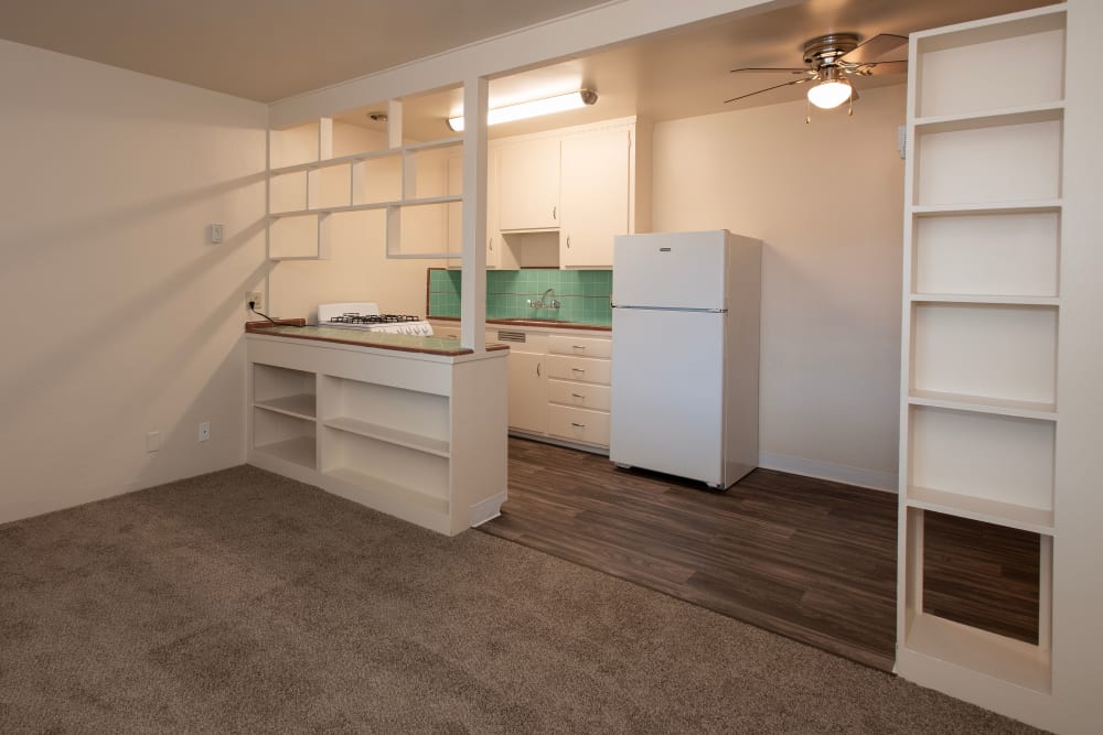 Living room and kitchen at Coralaire Apartments in Sacramento, California