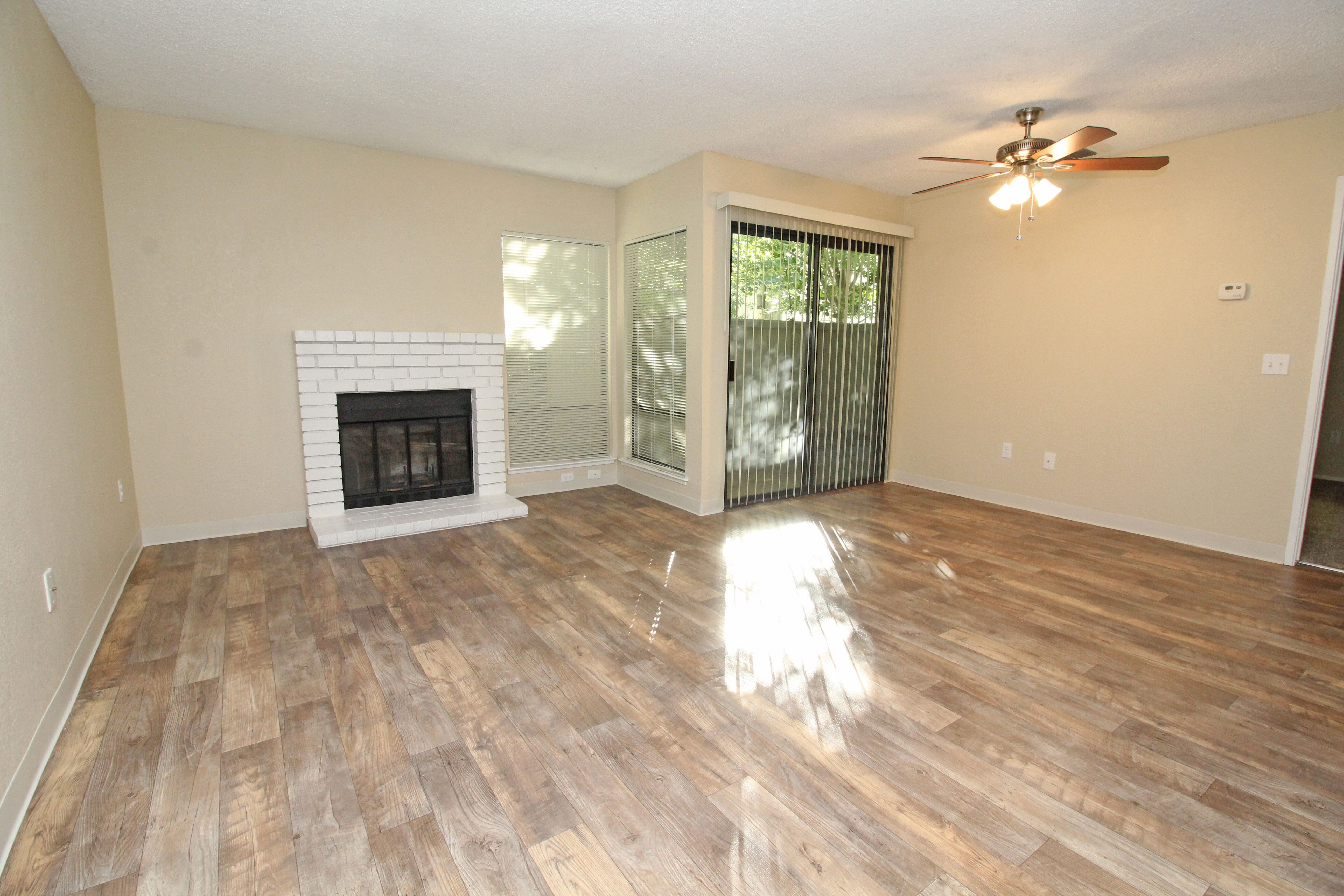 Fireplace in living room at Huntcliffe Apartments in Fair Oaks, California